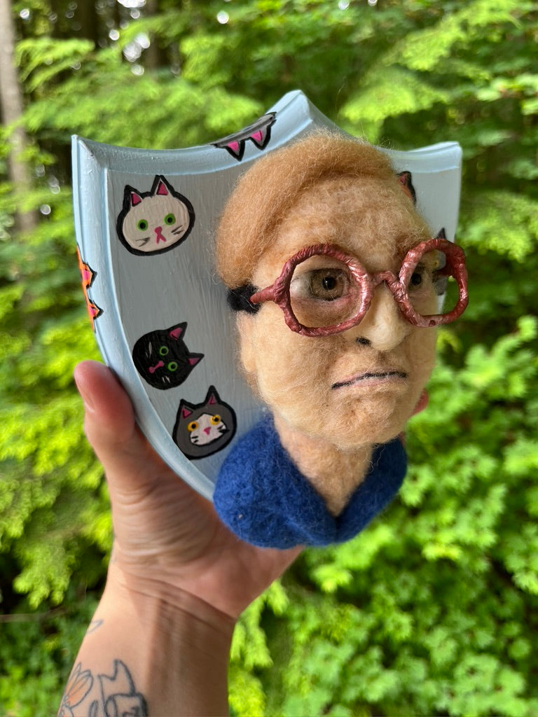 A needle felted portrait of Bubbles from Trailer Park Boys