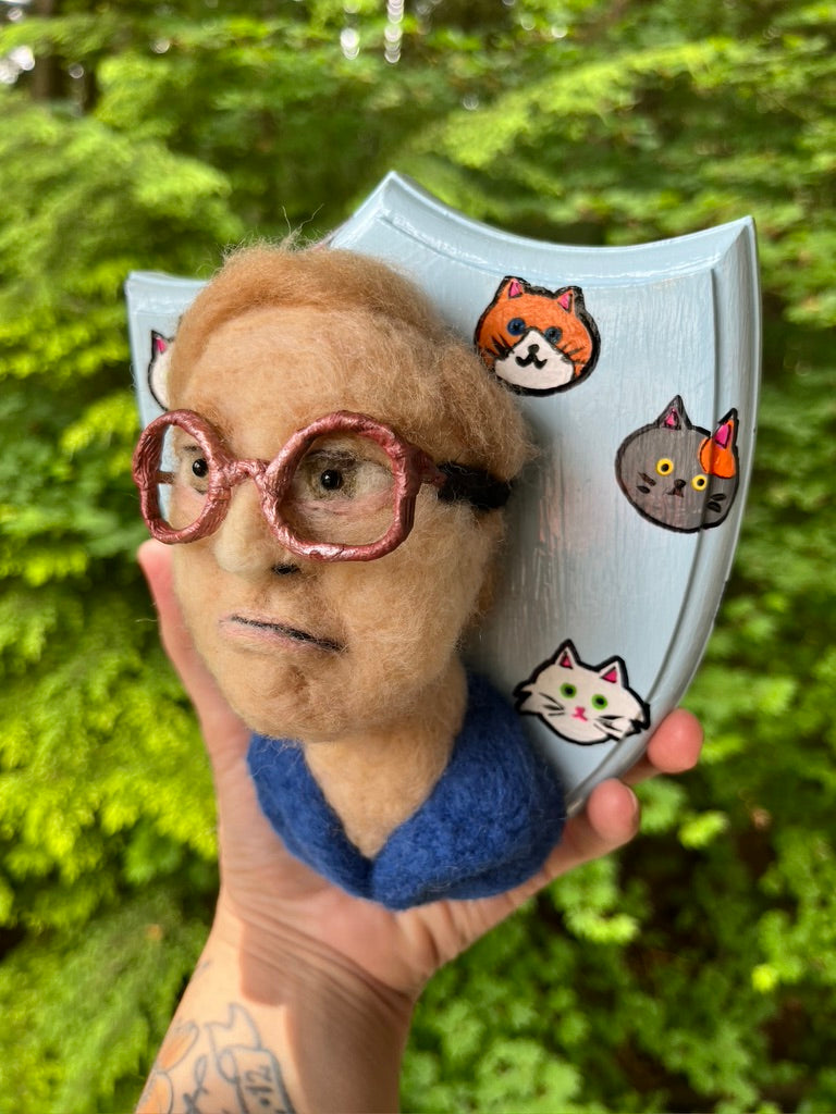 A needle felted portrait of Bubbles from Trailer Park Boys