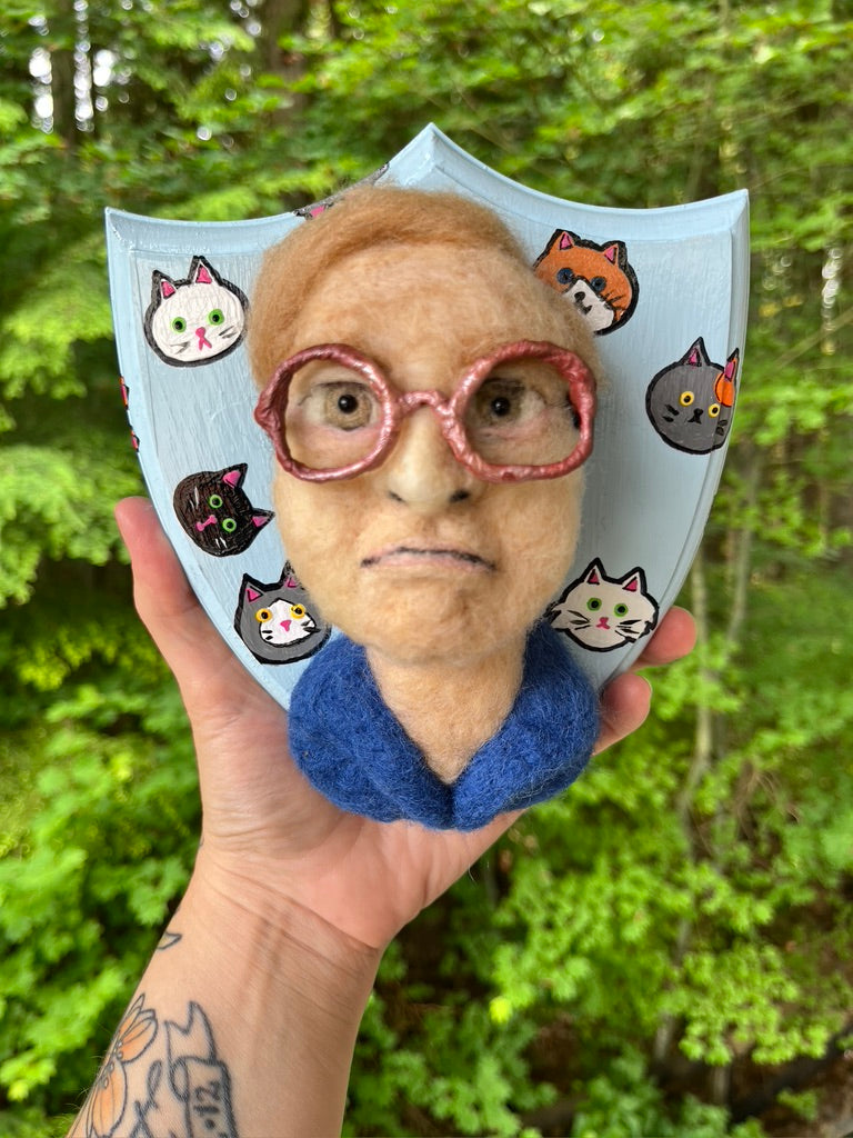 A needle felted portrait of Bubbles from Trailer Park Boys