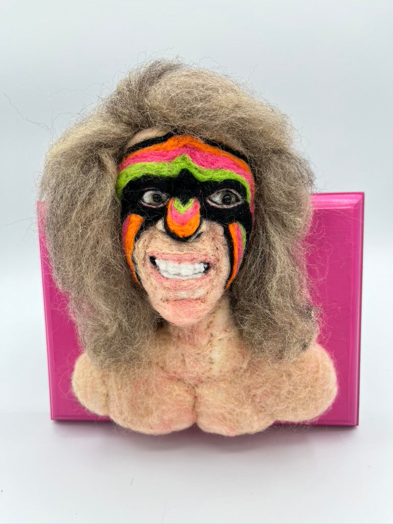 A custom needle felted portrait of the Ultimate Warrior from the WWF