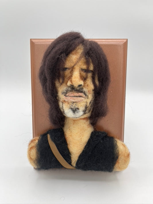 A custom needle felted portrait of Daryl Dixon from the Walking Dead