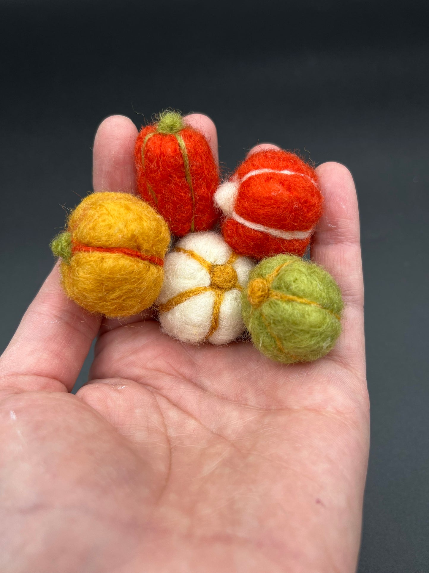 Make up to 5 mini pumpkins with this easy to follow DIY needle felting kit. 